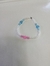 Pulsera caritas. en internet