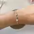 Pulseira Três Corações PL44