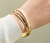Pulseira Ouro com Preto 67mm
