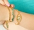 Pulseira Onda Ouro com Glitter Azul 68mm na internet