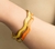 Pulseira Onda Ouro com Laranja 68mm - comprar online