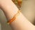 Pulseira Onda Ouro com Laranja 68mm