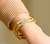 Pulseira Onda Ouro com Verde 68mm - comprar online