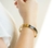 Pulseira Ouro com Preto 68mm na internet