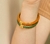 Pulseira Ouro com Verde Oliva 68mm na internet