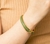 Pulseira Ouro com Verde Oliva 68mm