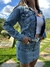 Imagem do Mini Saia Lateral Arredondada Clara - Jeans Marmorizado