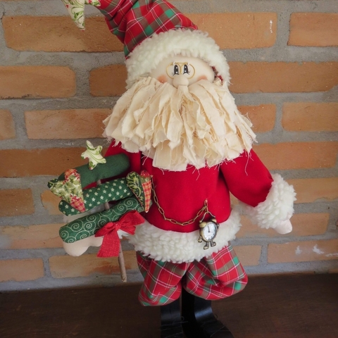 Papai Noel com pés de Madeira