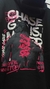Buzo Frizzado Negro Never Stop Fucsia - comprar online