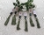 Porta guardanapo em resina verde e branca com tassel - comprar online