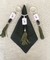 Porta guardanapo em resina verde e branca com tassel na internet