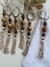 Porta guardanapo em resinas caramelo e entremeio prata com tassel - loja online