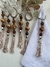 Imagem do Porta guardanapo em resinas caramelo e entremeio prata com tassel