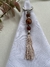 Porta guardanapo em resinas caramelo e entremeio prata com tassel - Bella Arte Mesa Posta