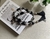 Colar de mesa em resinas pretas, entremeios prata e tassel - comprar online