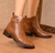 Bota de cano curto com ziper lateral e fivela detalhe dourado na sola cflx