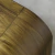Mesas bajas de madera con diseño curvado en dos alturas para living de estilo contemporáneo