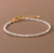 Pulsera ajustable de cuentas tipo perla y plata 925