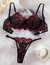COORDINADO NEGRO DETALLES ROJOS