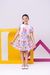 Conjunto infantil estampado, blusa com mangas de babados e saia de prega - comprar online