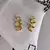 Brinco 4 Garras Banho de Ouro 18k - comprar online
