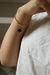 Pulseira cordão baiano fino com pingente preto folheada a ouro 18k