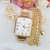 Kit Relogio Feminino Dourado + Pulseira, brincos e caixinhas - RF337
