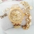 Kit Relogio Feminino Dourado Prova dagua + Pulseira, brincos e caixinhas - RF309