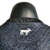 Image of Camisa Portugal Edição Goat 23/24 - Jogador Masculina - Preta com detalhes em vermelho e dourado
