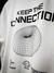 Remera oversize Keep the connection