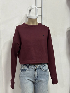 Buzo liso crop con detalle - comprar online