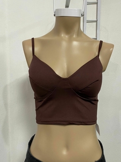 Top con taza y push up en internet