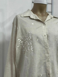 Camisa con bolsillos de lentejuelas en internet