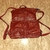 mochila vermelha de couro sintético