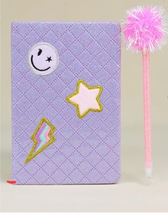 Cuaderno con bolígrafo