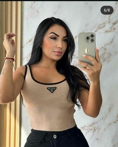 blusa prada manga siza - districamisetaspereira