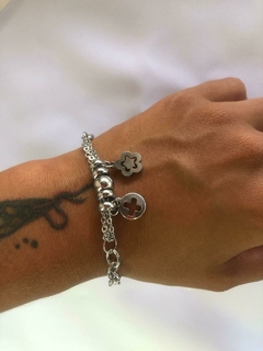 Pulsera A.Q. Dijes Flor y Cruz