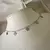 Choker de aço 7 coraçoes 47 cm regulável na internet