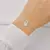 Pulseira Trevo Resina Branco Misto - comprar online