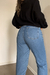 Calça Mom cós alto na internet