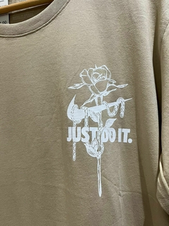 CAMISA NK JUST DO IT FLOWERS na internet