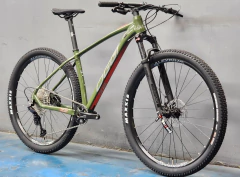 BICICLETA MTB OGGI 29 BW 7.2 DEORE 12V VD/VERM/CINZA 15,5 2026