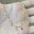 Colar Hastes c/ Crucifixo (Banho Ouro 24k) na internet