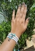 Conjunto pulseiras macrame estrela do mar e concha regulável