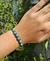 Pulseira macrame preta com miçangas regulável