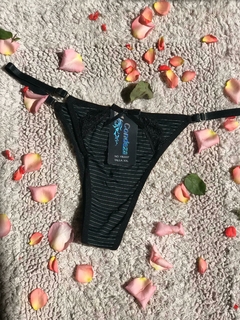 BOMBACHA REGULABLE DE LYCRA NEGRA CON DETALLES BLANCOS