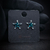 Brinco de prata estrela azul com pontos de luz
