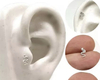 Piercing tragus cobrinha. Prata 925 e aço cirúrgico