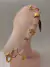 Ear cuff con pluma dorada - comprar en línea