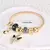 Pulsera de mariposa de bailarina de oro rosa para mujeres y niñas en internet